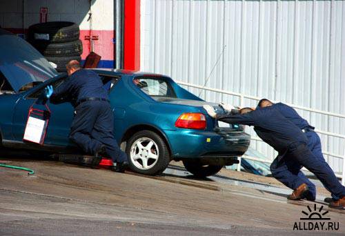 Stock Photo: People pushing broken car | Люди, толкащие сломанную машину
