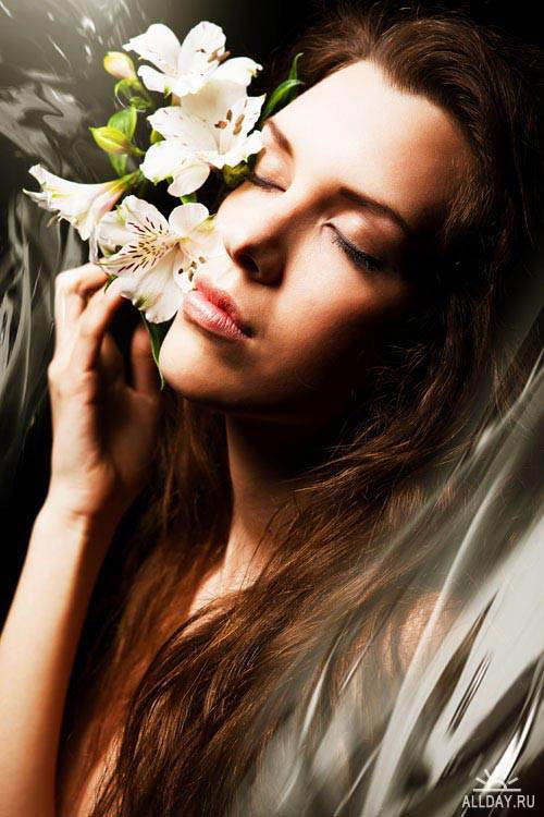 Stock Photo: Beautiful woman with flowers | Красивая девушка с цветами