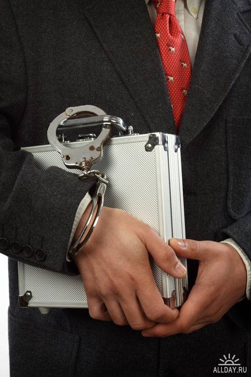 Stock Photo: Businessman with handcuffs | Бизнесмен в наручниках